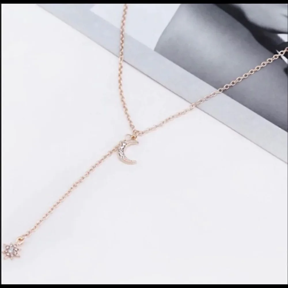 Gold Tone Moon & Star Necklace